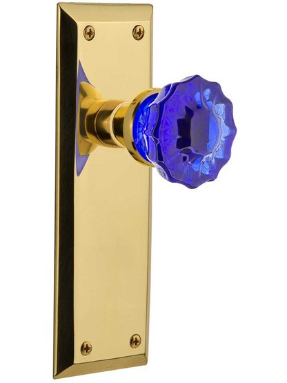 New York Door Set with Colored Fluted Crystal Glass Knobs Cobalt Blue in Polished Brass.